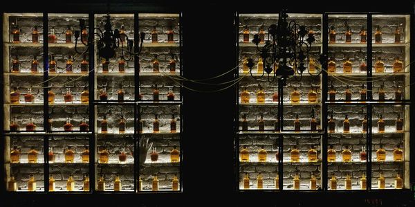 Full frame shot of glass bottles