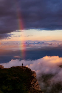 Scenic view of mountains against dramatic sky