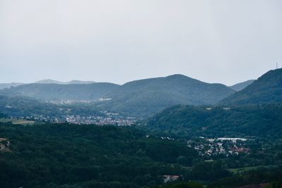 Scenic view of landscape and mountains against sky