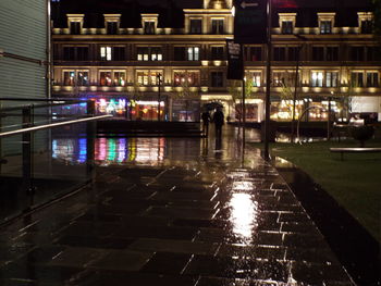 Buildings in city at night