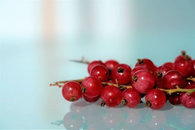 Close-up of cherries on table