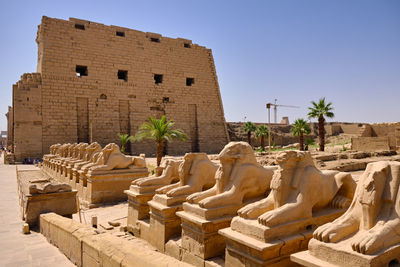 Ruins of historic building against sky