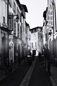 People walking on street in city