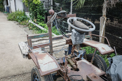 Old rusty bicycle on field