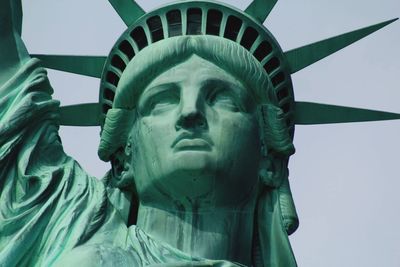 Low angle view of statue against the sky