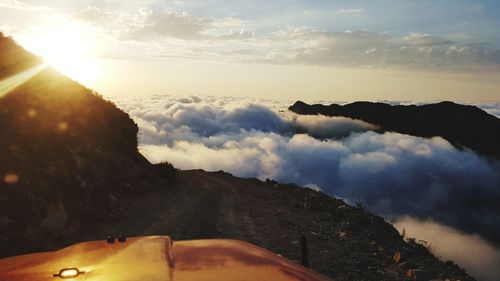 Scenic view of mountains against sky during sunset