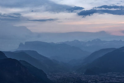 Scenic view of mountains against sky during sunset