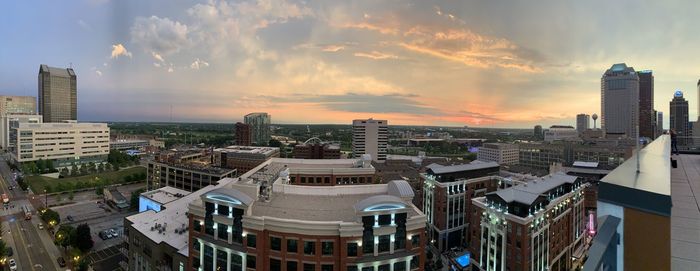 High angle view of buildings against sky during sunset