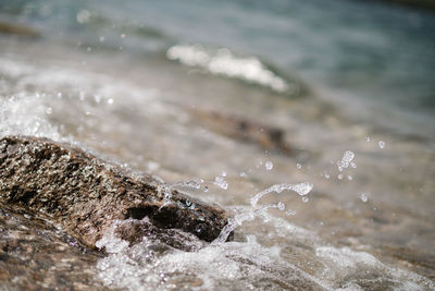 Close-up of water splashing on rocks