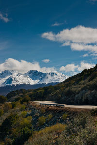 Scenic view of snowcapped mountains against sky