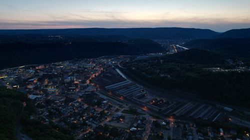 High angle view of illuminated buildings in city