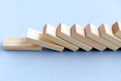 High angle view of chairs against blue background
