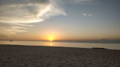 Scenic view of sea during sunset