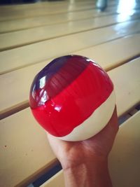 Close-up of hand holding ice cream