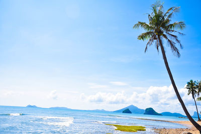 Scenic view of sea against blue sky