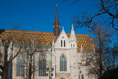 View of matthias church, located in budapest, hungary, in front of the fisherman's bastion