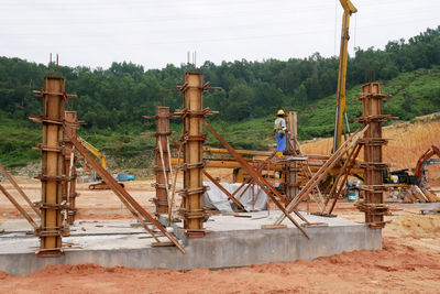 Man working at construction site in forest