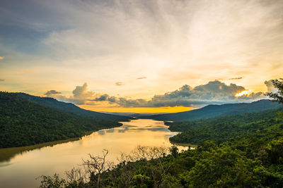 Scenic view of lake against sky during sunset