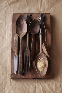 Wood utensils for cooking on cutting board