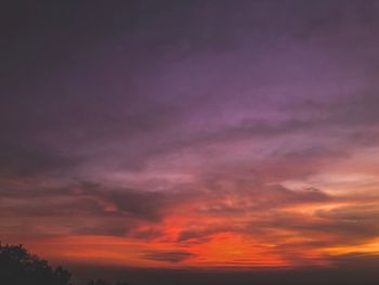 Low angle view of dramatic sky during sunset