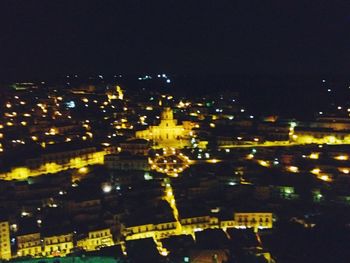 Illuminated city at night