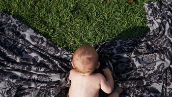 HIGH ANGLE VIEW OF SHIRTLESS BABY GIRL