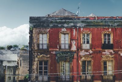 Abandoned building against sky