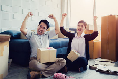 Young couple sitting on sofa