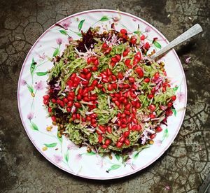 High angle view of chopped vegetables in bowl on table