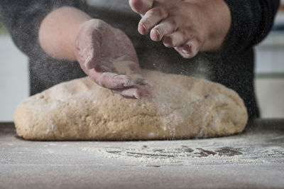 Close-up of person preparing food