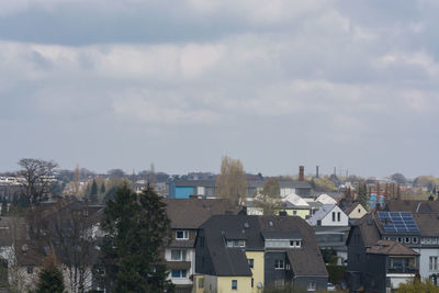 High angle view of buildings against sky