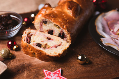 Traditional venezuelan dish known as pan de jamon meaning ham with bread with christmas decoration