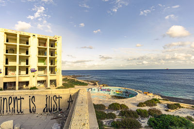 Scenic view of beach against sky