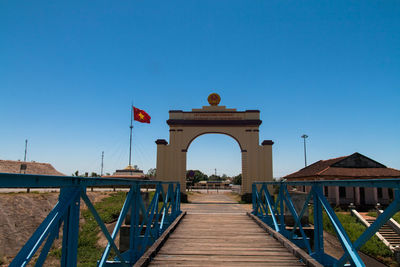 Bridge against clear blue sky