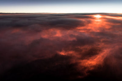 Scenic view of dramatic sky during sunset