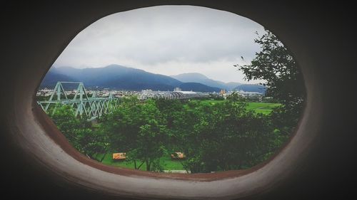 Scenic view of landscape and mountains against sky