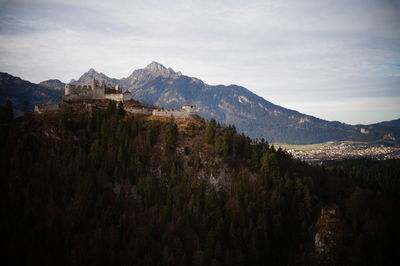 Scenic view of landscape and mountains against sky