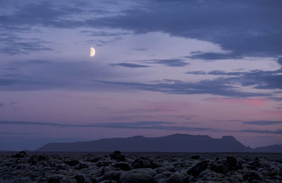 Sunset moon combination in the early august on iceland.