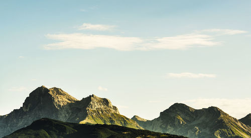 Low angle view of rocks against sky