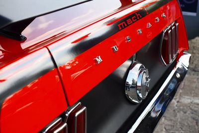 Close-up of red vintage car