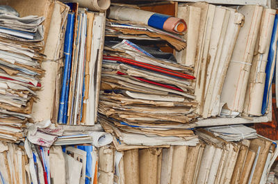 Old paper documents on shelves