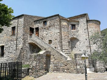 Low angle view of old building against sky