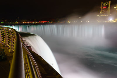 Blurred motion of illuminated city at night