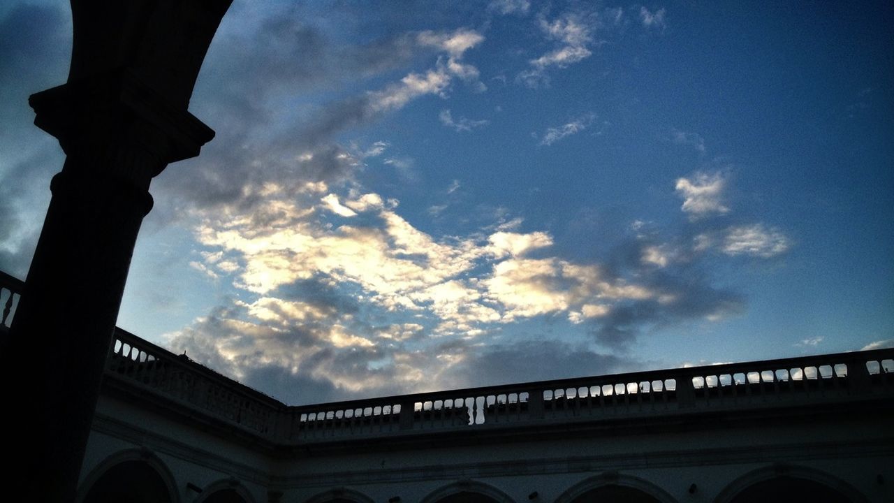 LOW ANGLE VIEW OF BUILT STRUCTURE AGAINST SKY