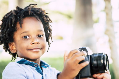 Portrait of happy man photographing