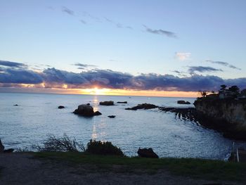 Scenic view of sea at sunset
