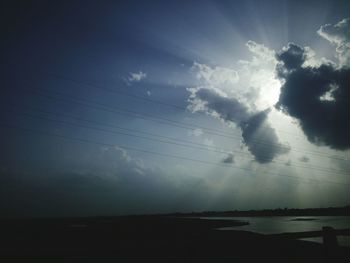 Scenic view of calm lake against sky