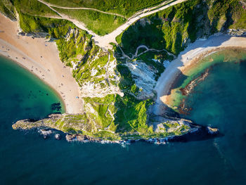 High angle view of man swimming in sea