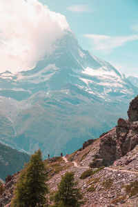 Scenic view of snowcapped mountains against sky