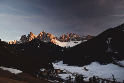 Scenic view of mountains against sky during winter